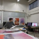 An image of a student working inside Digital Art Service Lab